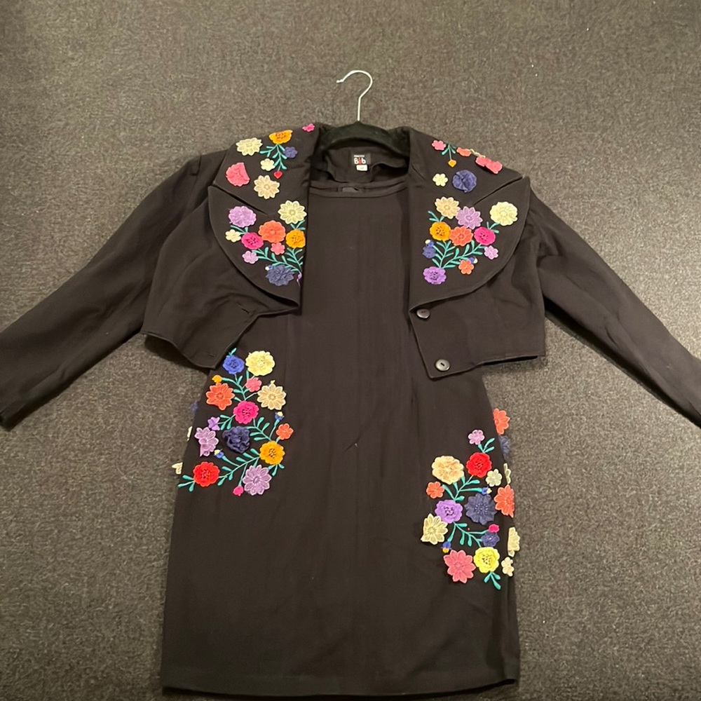 Two piece dress. Bolero jacket. Floral appliqué.